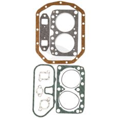 Pakningssæt øverst til præcis reparation af motorkomponenter.