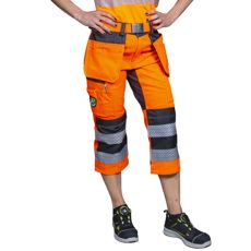 Orange capribukser med sømlommer i stretch, perfekt til aktive dage.